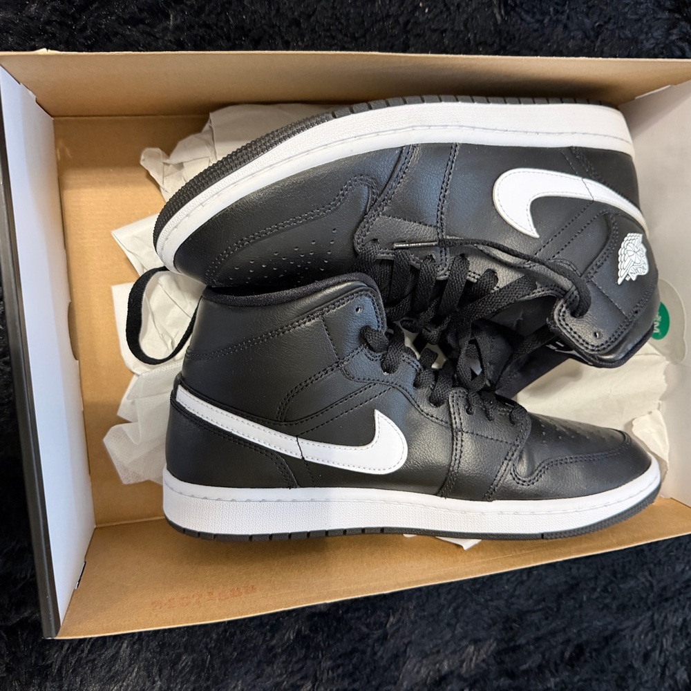 Jordan Black and White High-Top Sneakers